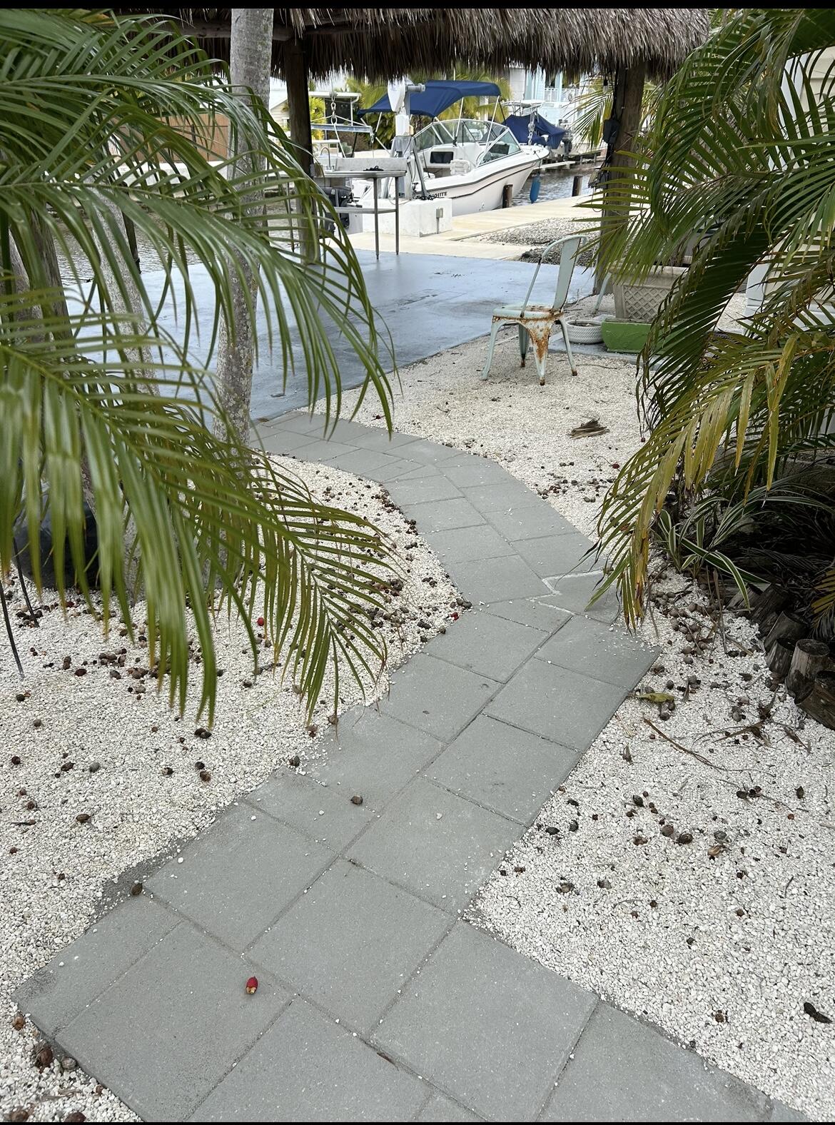 343 Vaca Road Key Largo, FL 33037 - Photo 17 of 22 Pathway to dock/tiki hut