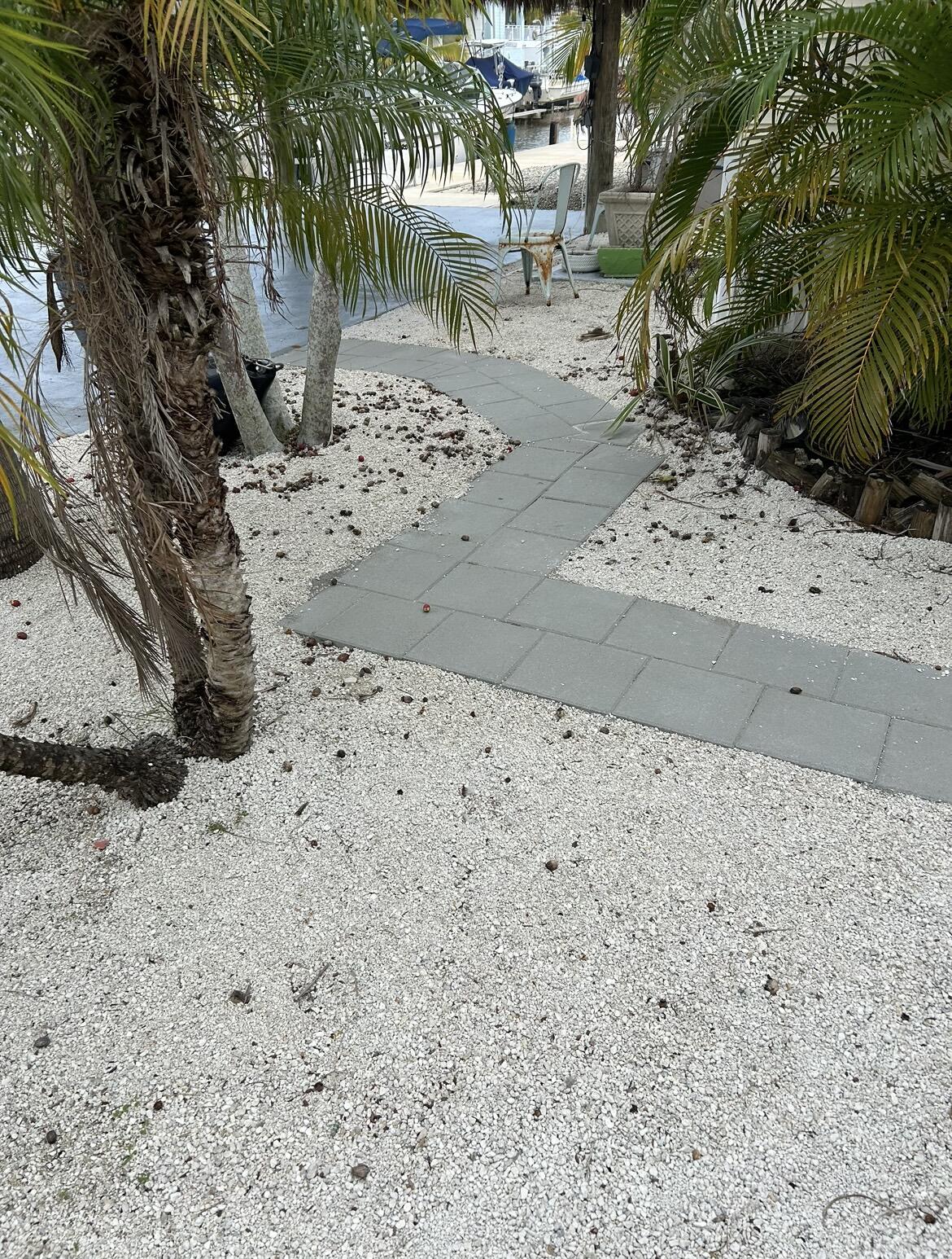 343 Vaca Road Key Largo, FL 33037 - Photo 22 of 22 Pathway to back yard