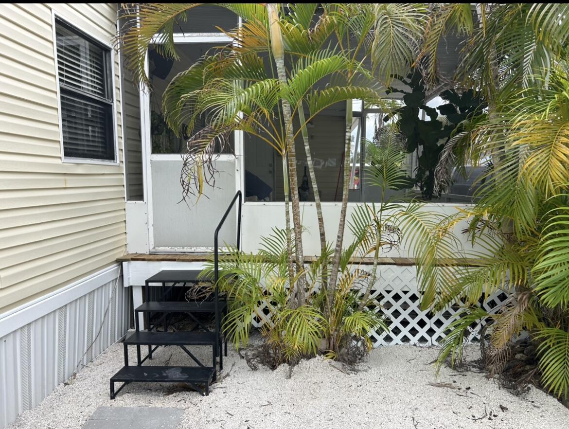 343 Vaca Road Key Largo, FL 33037 - Photo 3 of 22 Side of Porch exit