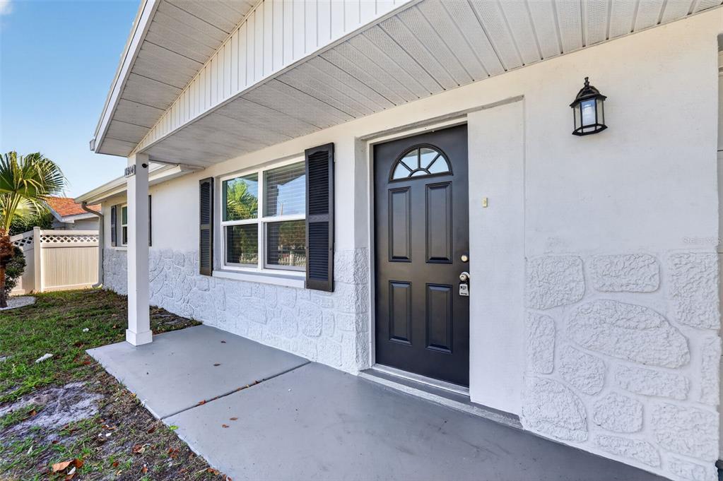 10914 Leeds Road Port Richey, FL 34668 - Photo 3 of 24 a view of front door of house