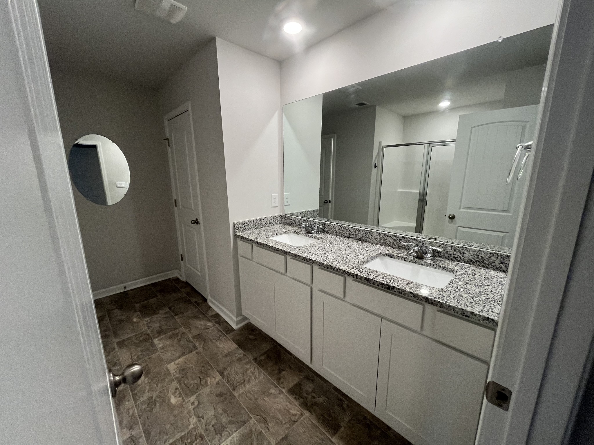 441 Waterfowl Way Lebanon, TN 37090 - Photo 11 of 21 a bathroom with a granite countertop sink and a mirror