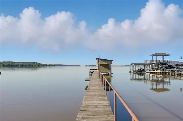 a lake view with boat and a lake view