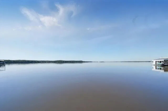 a view of a lake with a city