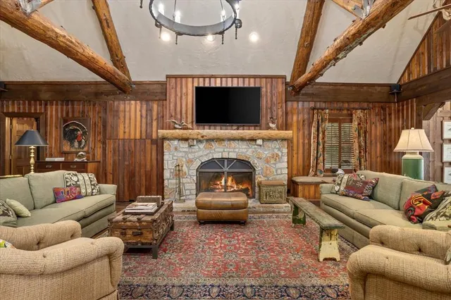 a living room with furniture or fireplace and a flat screen tv