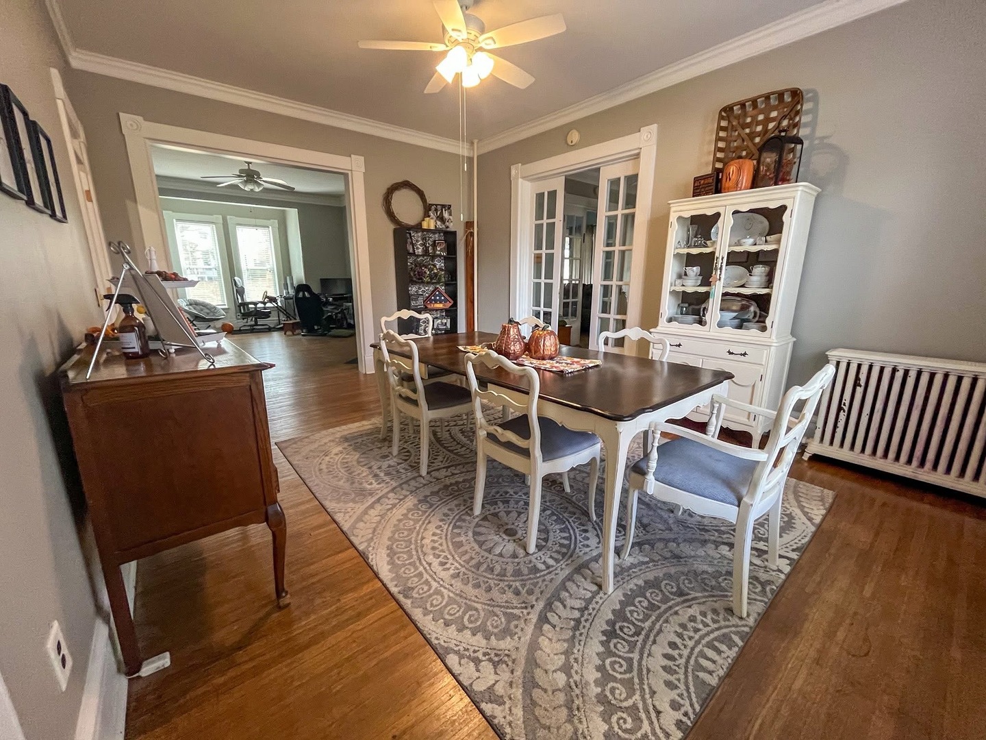 340 South Main Street Sheffield, IL 61361 - Photo 10 of 32 a dining room with furniture a chandelier and wooden floor