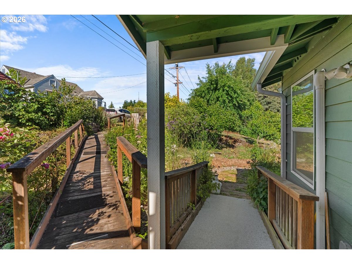 772 Division Street Oregon City, OR 97045 - Photo 36 of 47 a view of a balcony with wooden floor