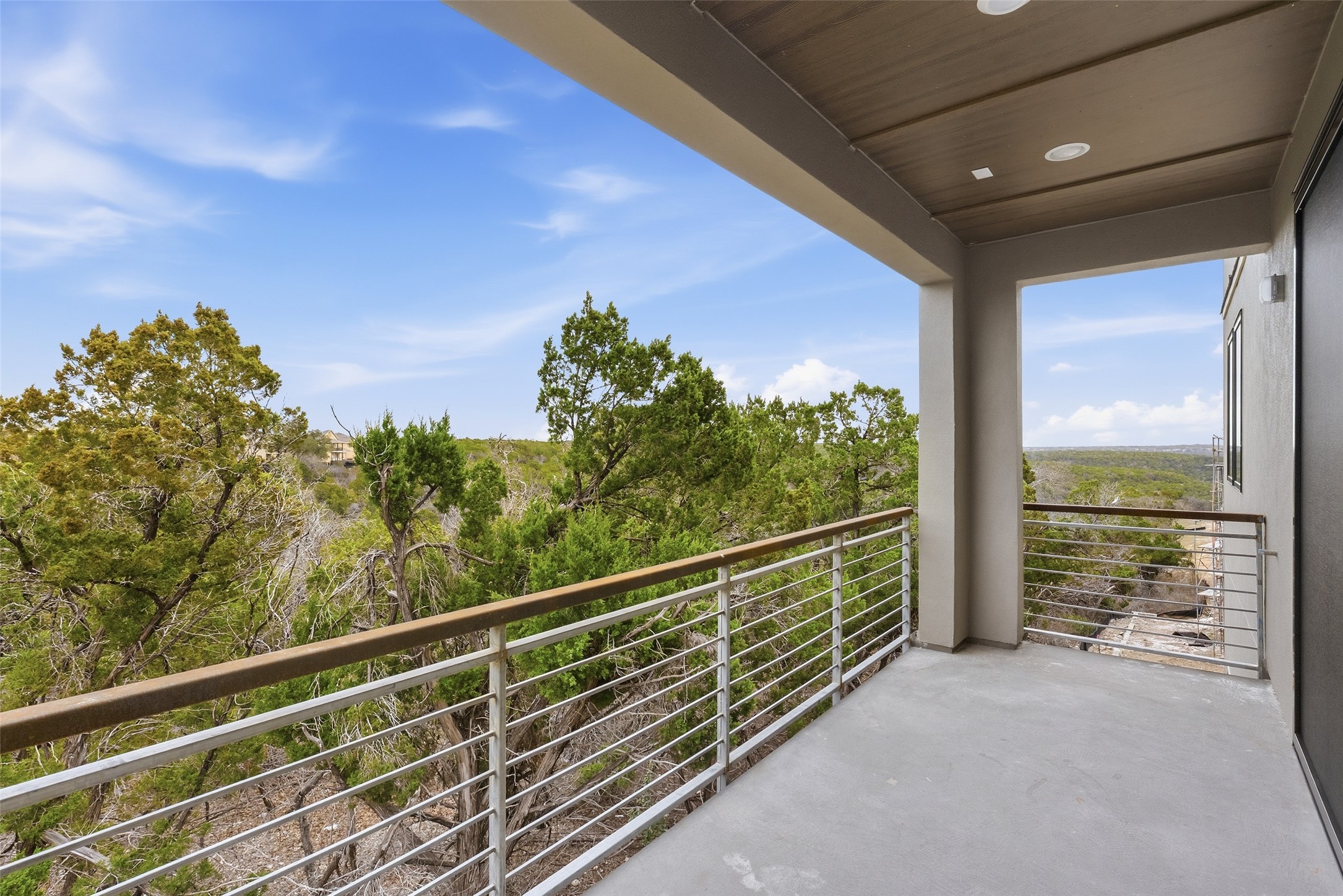 9803 Ribelin Ranch Court, Unit 10 Austin, TX 78750 - Photo 11 of 18 a view of a balcony with mountain view