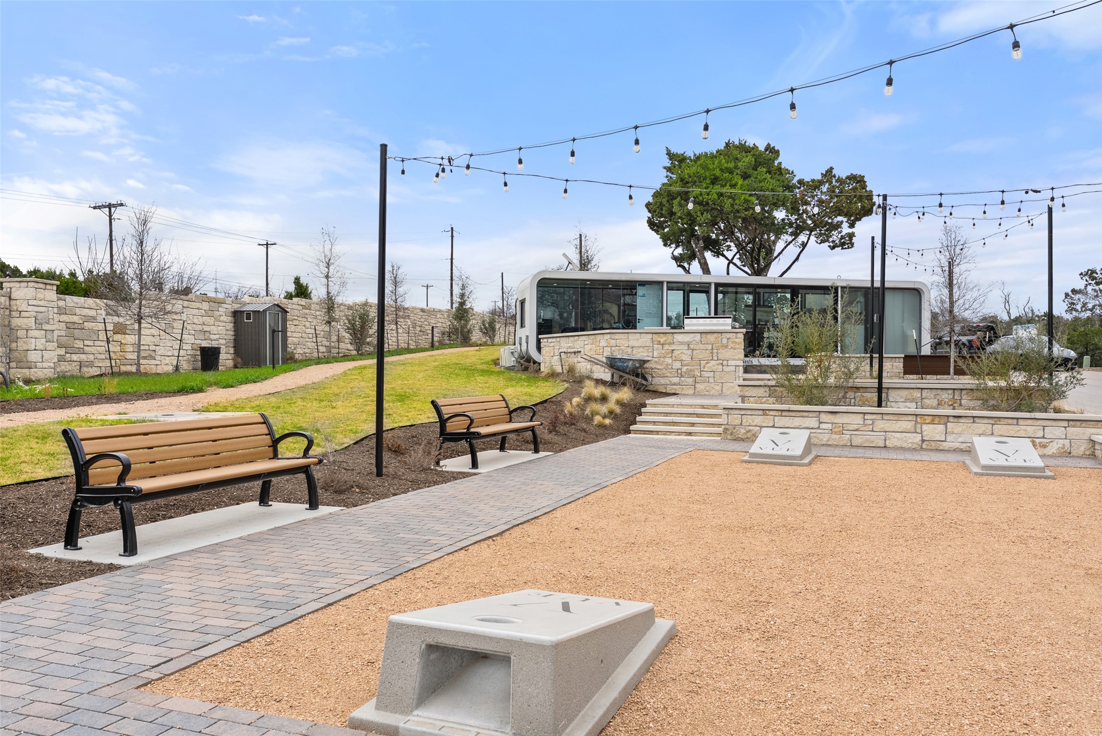 9803 Ribelin Ranch Court, Unit 10 Austin, TX 78750 - Photo 15 of 18 a swimming pool with outdoor seating and yard