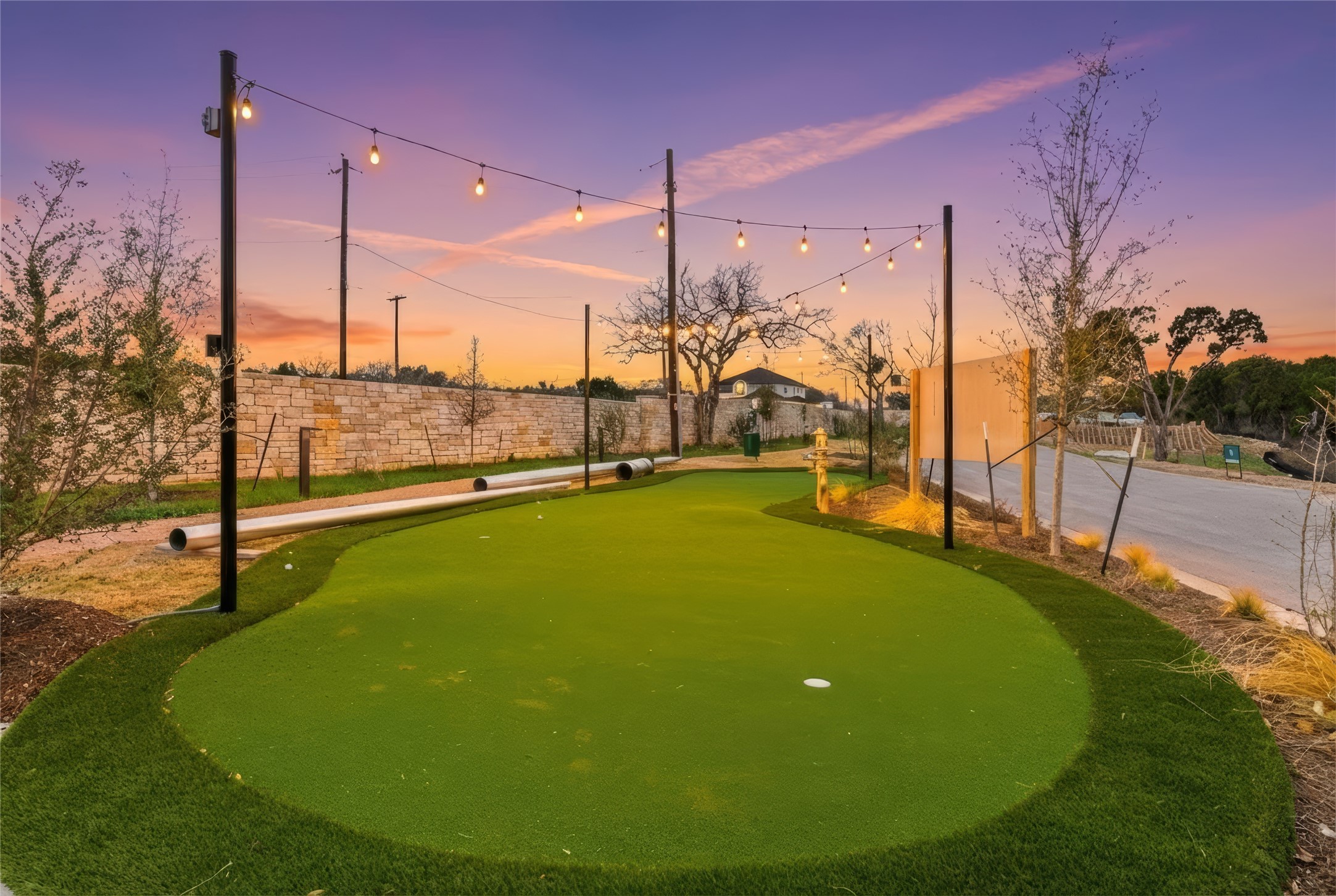 9803 Ribelin Ranch Court, Unit 10 Austin, TX 78750 - Photo 17 of 18 a view of a house with a swimming pool