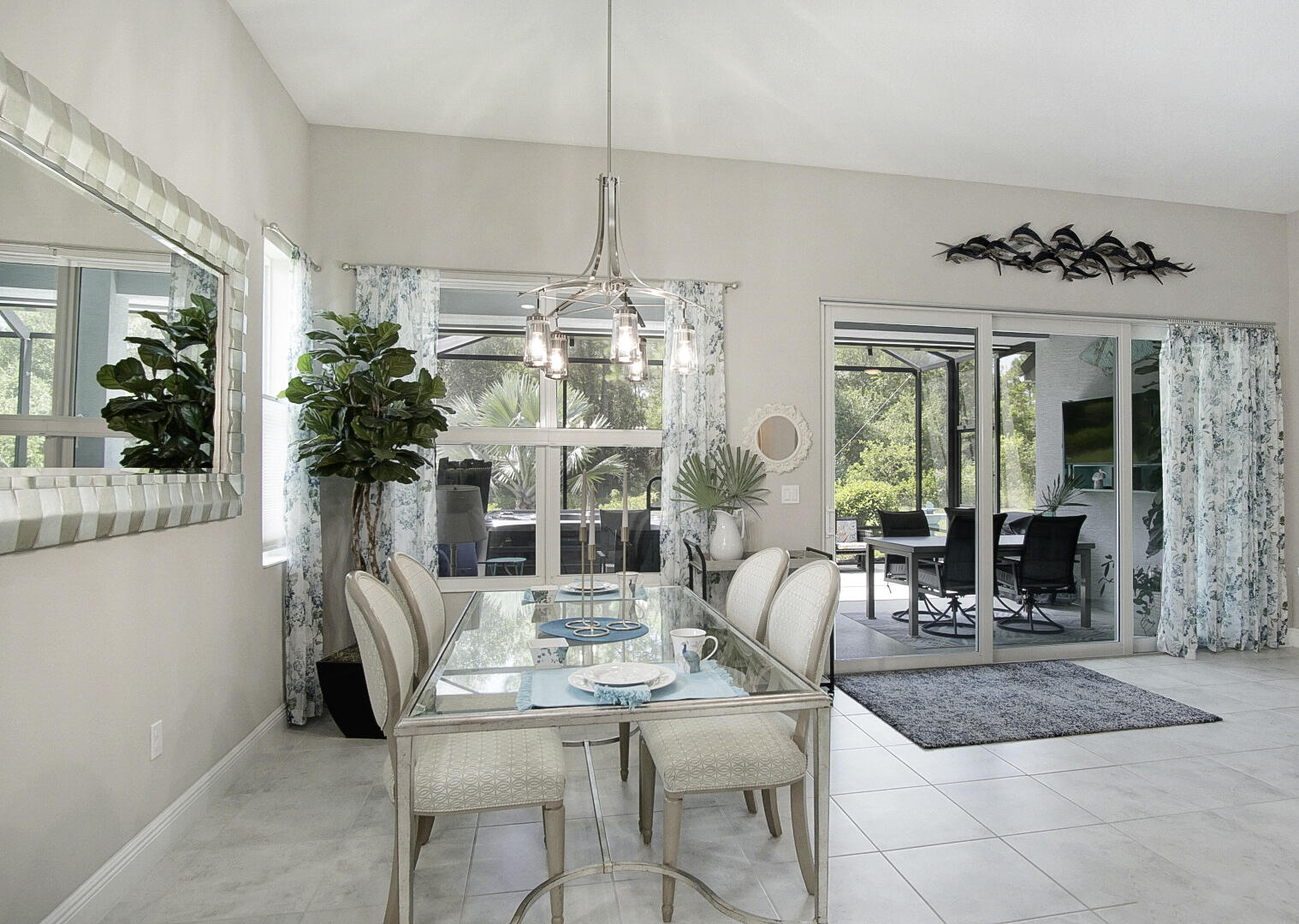2652 Conifer Drive Fort Pierce, FL 34951 - Photo 14 of 45 a living room with furniture and potted plants
