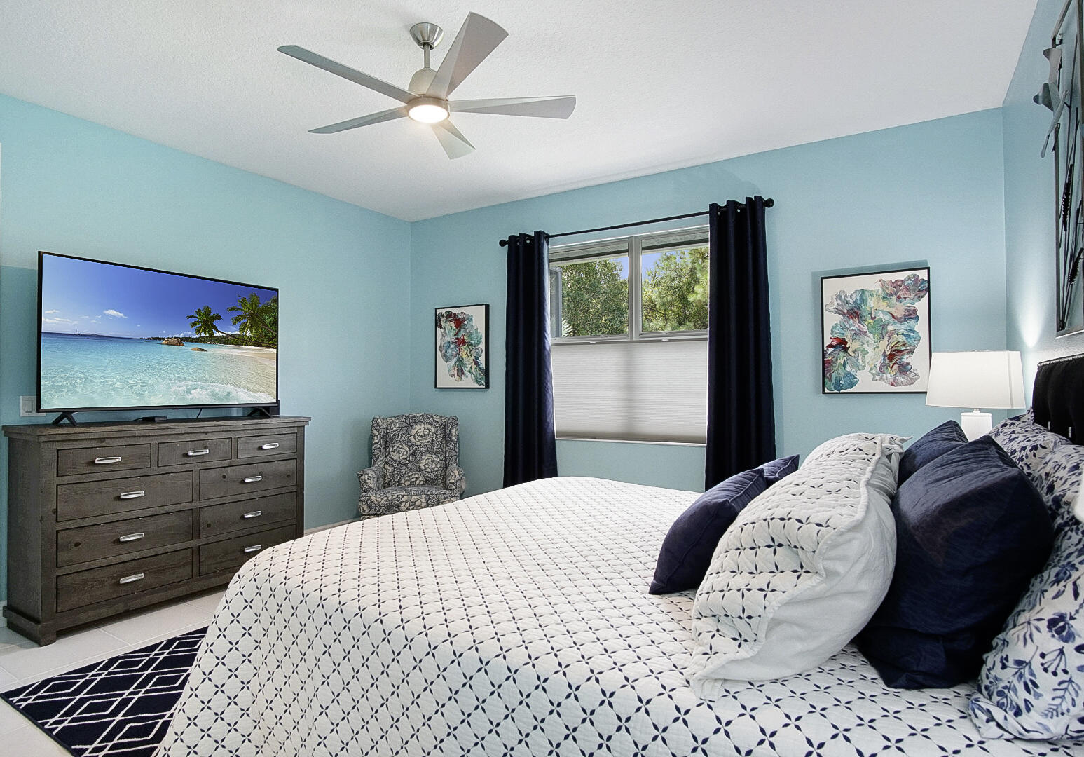 2652 Conifer Drive Fort Pierce, FL 34951 - Photo 22 of 45 a bedroom with a bed and a flat screen tv
