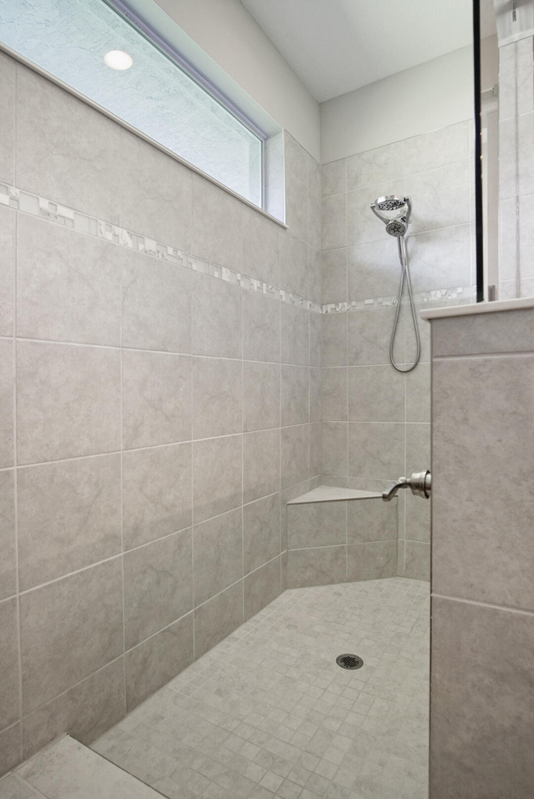 2652 Conifer Drive Fort Pierce, FL 34951 - Photo 26 of 45 a bathroom with a shower