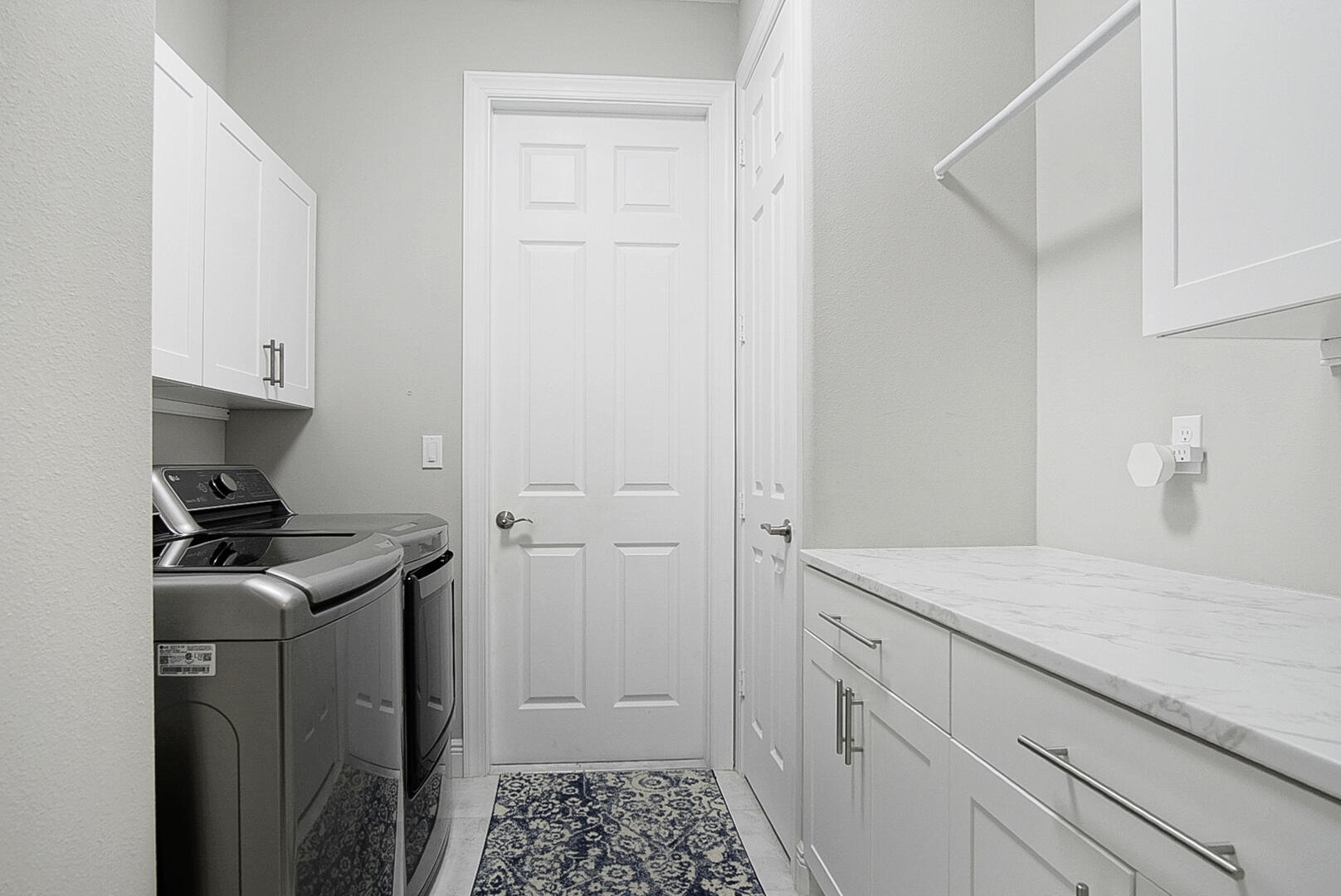 2652 Conifer Drive Fort Pierce, FL 34951 - Photo 28 of 45 a kitchen with a stove and a refrigerator