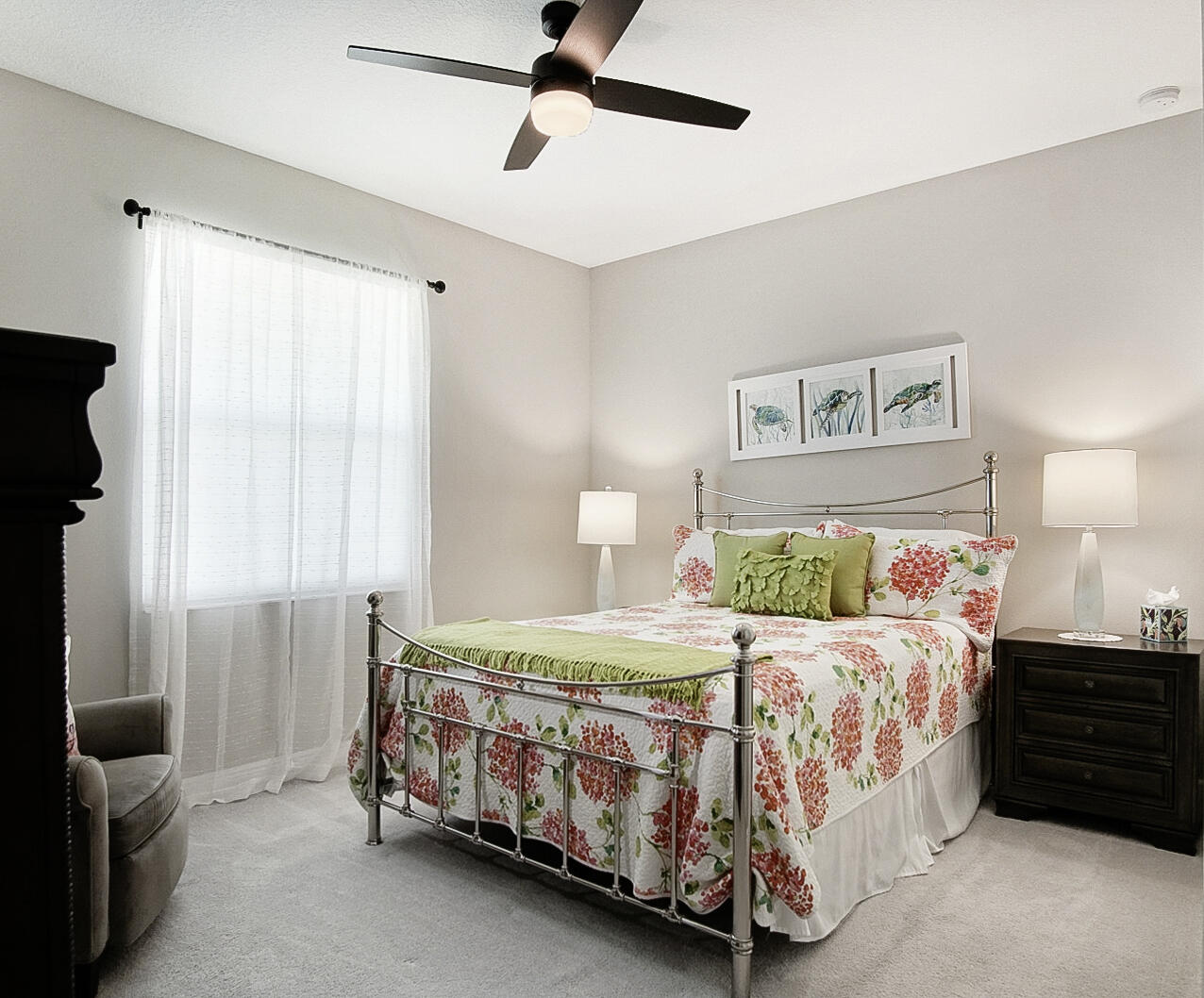 2652 Conifer Drive Fort Pierce, FL 34951 - Photo 29 of 45 a bedroom with a bed and a chandelier