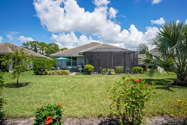 a view of a garden in front of a house