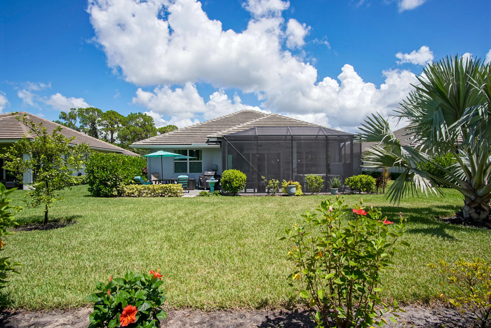 2652 Conifer Drive Fort Pierce, FL 34951 - Photo 40 of 45 a view of a garden in front of a house