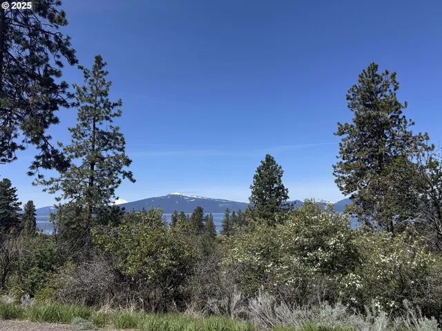 a view of a house with a street