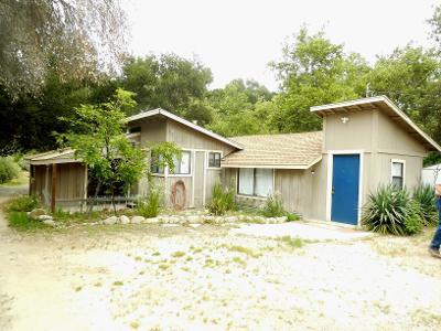 37145 Nason Road, Unit ABC Carmel Valley, CA 93924 - Photo 3 of 3 a view of a house with a yard