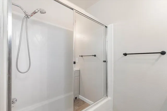 a bathroom with a bath tub