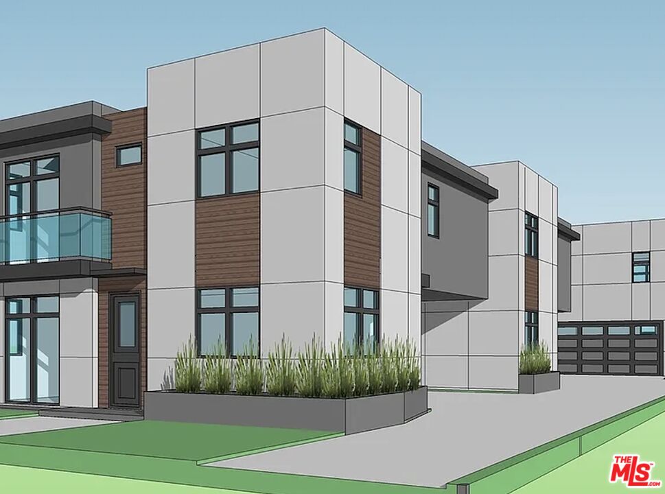 14136 Tiara Street Van Nuys, CA 91401 - Photo 2 of 3 a front view of a building with a garden