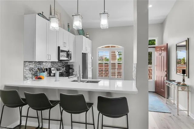 $349,000 | 278 Newport Drive, Unit 207, Naples, FL 34114