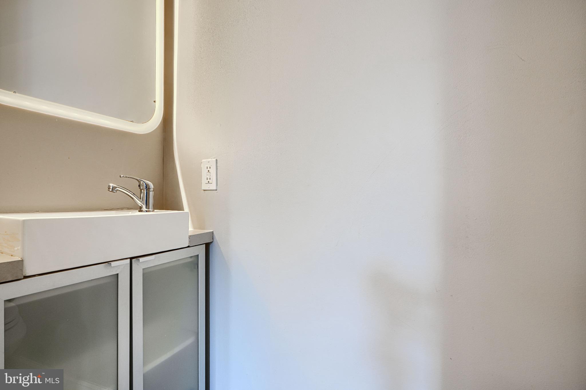 1410 East Oliver Street Baltimore, MD 21213 - Photo 17 of 40 a close up view of washer and dryer