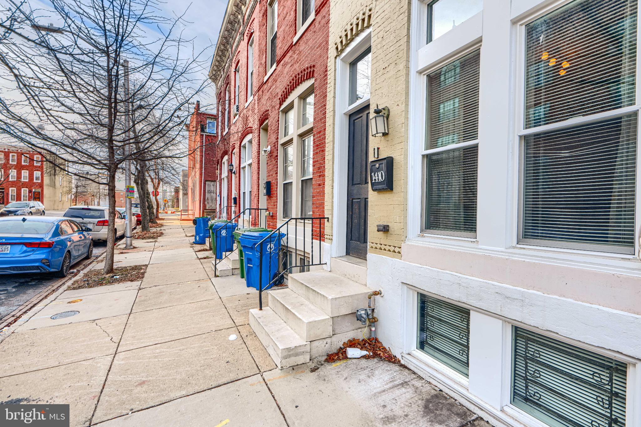 1410 East Oliver Street Baltimore, MD 21213 - Photo 3 of 40 Charming urban street with historic facades.