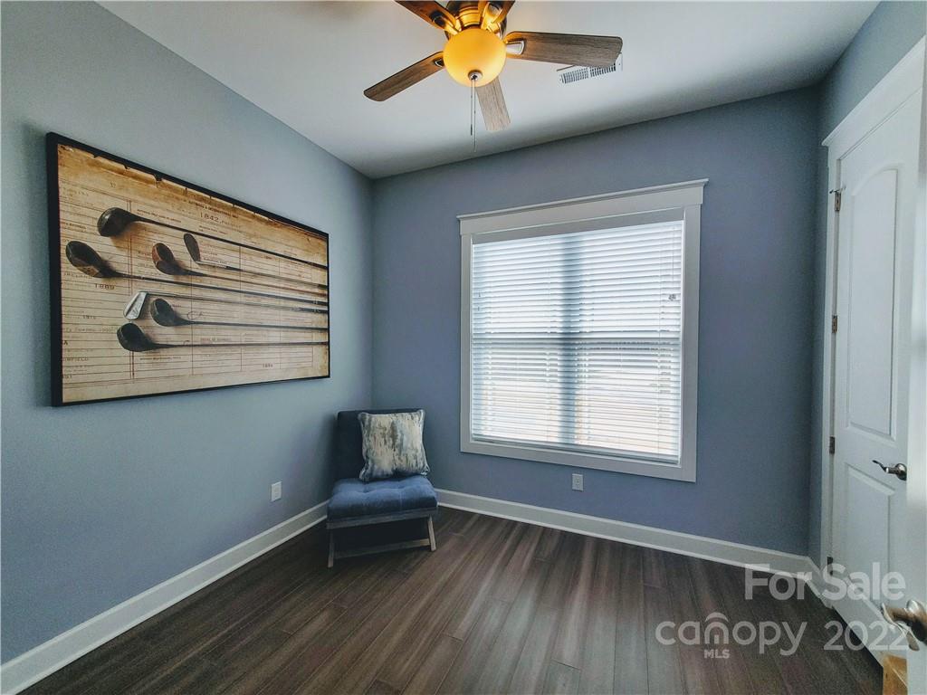 8596 Amandine Way Terrell, NC 28682 - Photo 13 of 25 a living room with a bed and a window