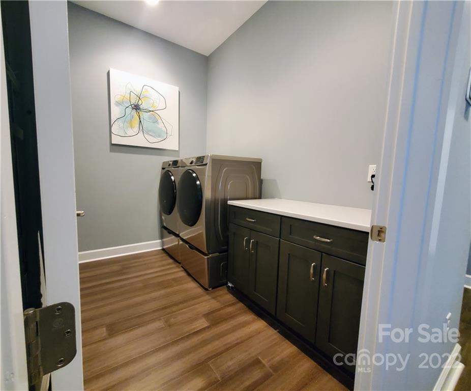 8596 Amandine Way Terrell, NC 28682 - Photo 19 of 25 a bedroom with a bed and a painting on the wall