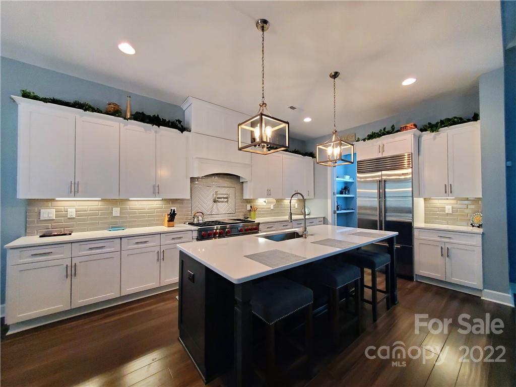 8596 Amandine Way Terrell, NC 28682 - Photo 2 of 25 a kitchen with a sink stove and cabinets