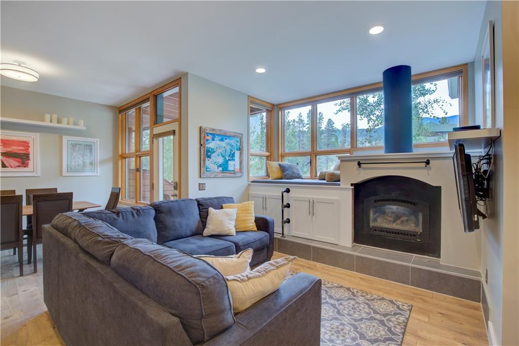 2017 Soda Ridge Road, Unit 1942 Keystone, CO 80435 - Photo 1 of 33 a living room with furniture and a fireplace