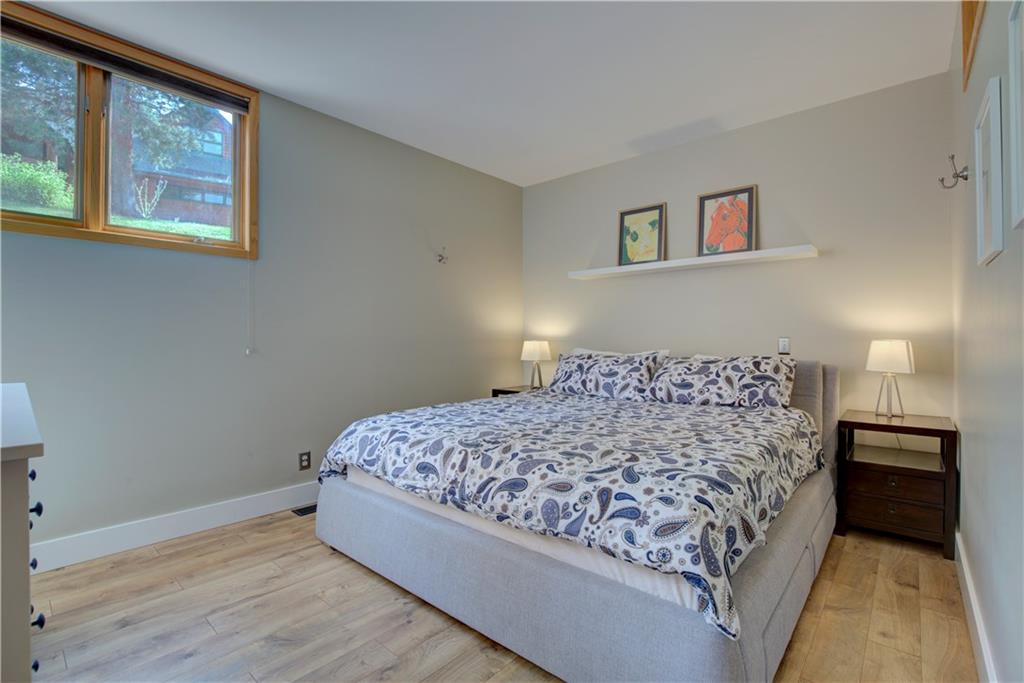2017 Soda Ridge Road, Unit 1942 Keystone, CO 80435 - Photo 23 of 33 a large bed sitting in a bedroom next to a window