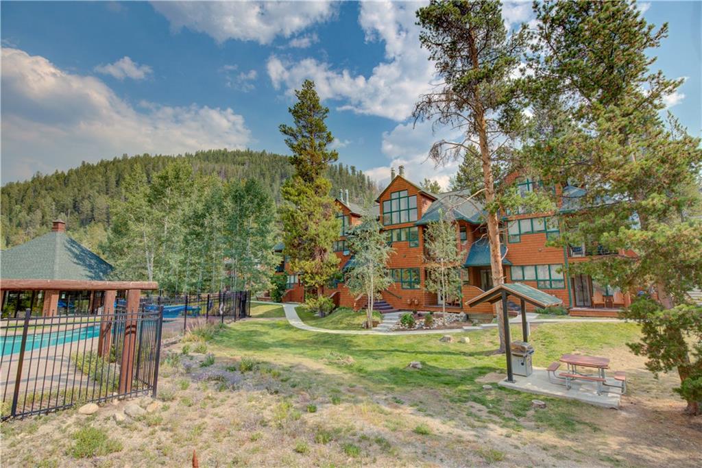 2017 Soda Ridge Road, Unit 1942 Keystone, CO 80435 - Photo 31 of 33 a view of a house with a yard