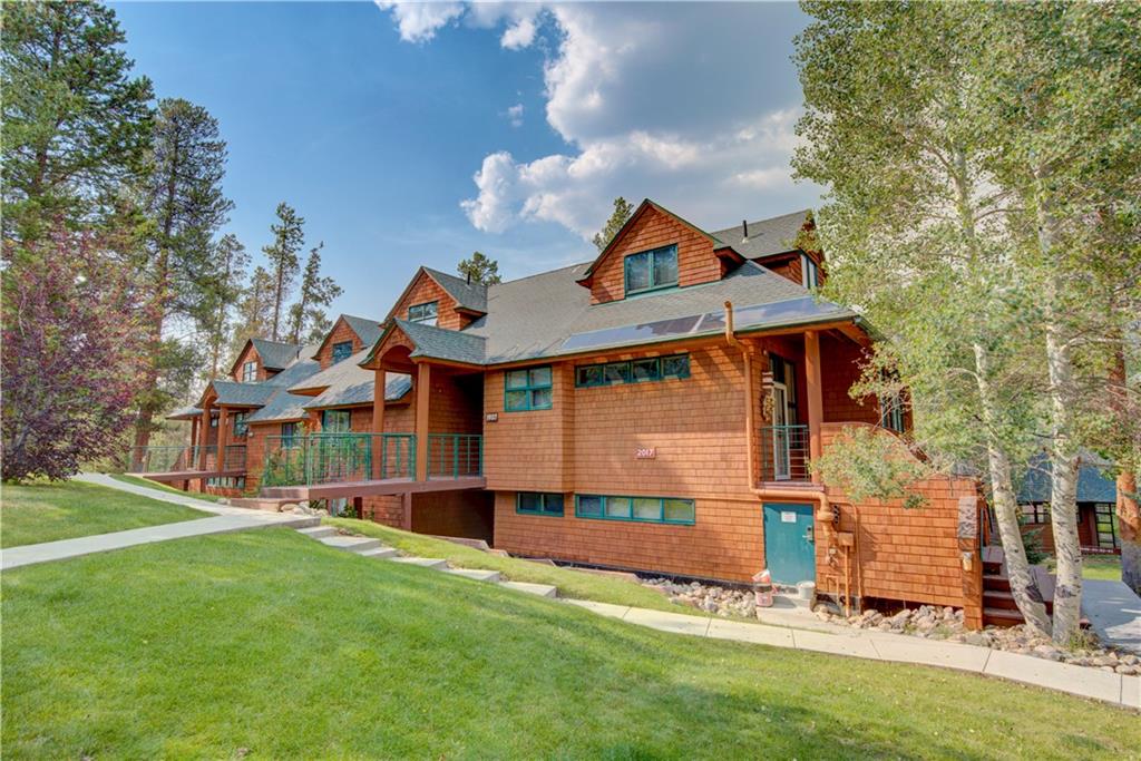 2017 Soda Ridge Road, Unit 1942 Keystone, CO 80435 - Photo 33 of 33 a front view of a house with a yard and fence