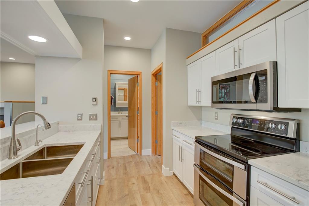 2017 Soda Ridge Road, Unit 1942 Keystone, CO 80435 - Photo 9 of 33 a kitchen with a sink stove and refrigerator