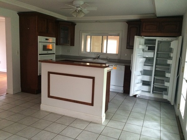 210 Oakham Road Barre, MA 01005 - Photo 8 of 17 a kitchen with granite countertop a stove and a sink