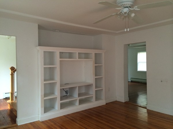 210 Oakham Road Barre, MA 01005 - Photo 10 of 17 a view of an empty room with wooden floor and closet