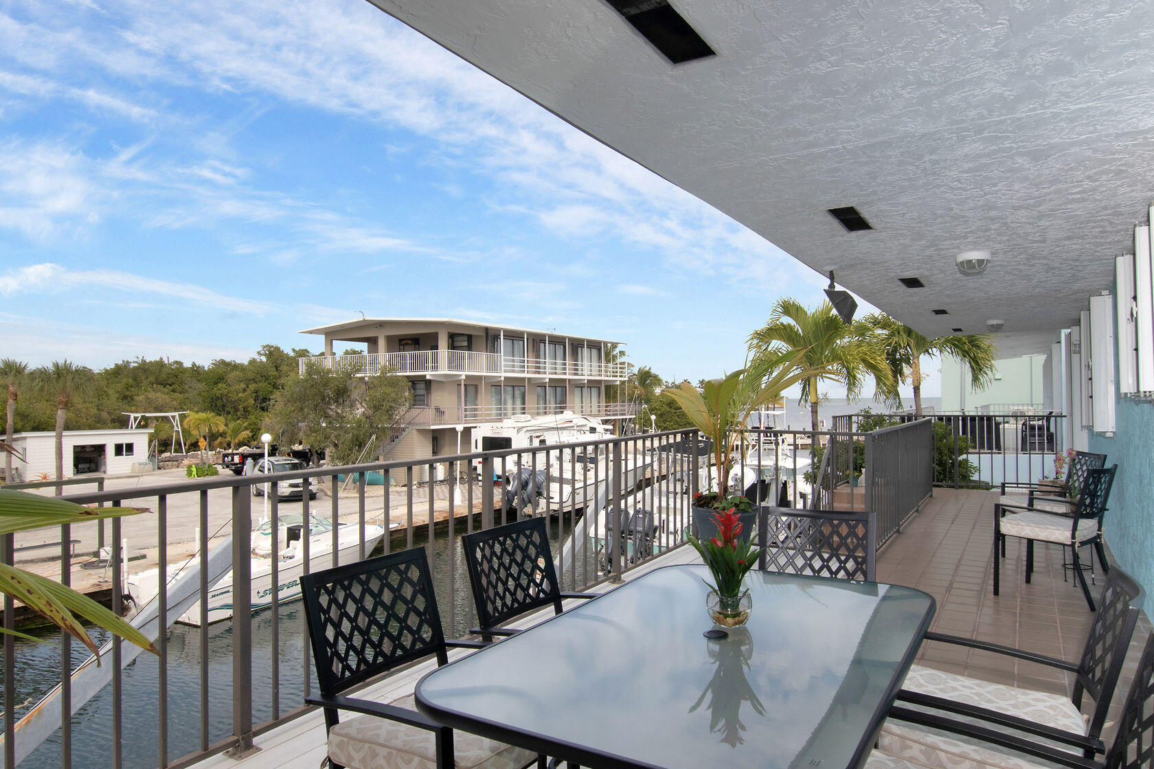 80 Seagate Boulevard Key Largo, FL 33037 - Photo 16 of 46 a view of a balcony with chairs