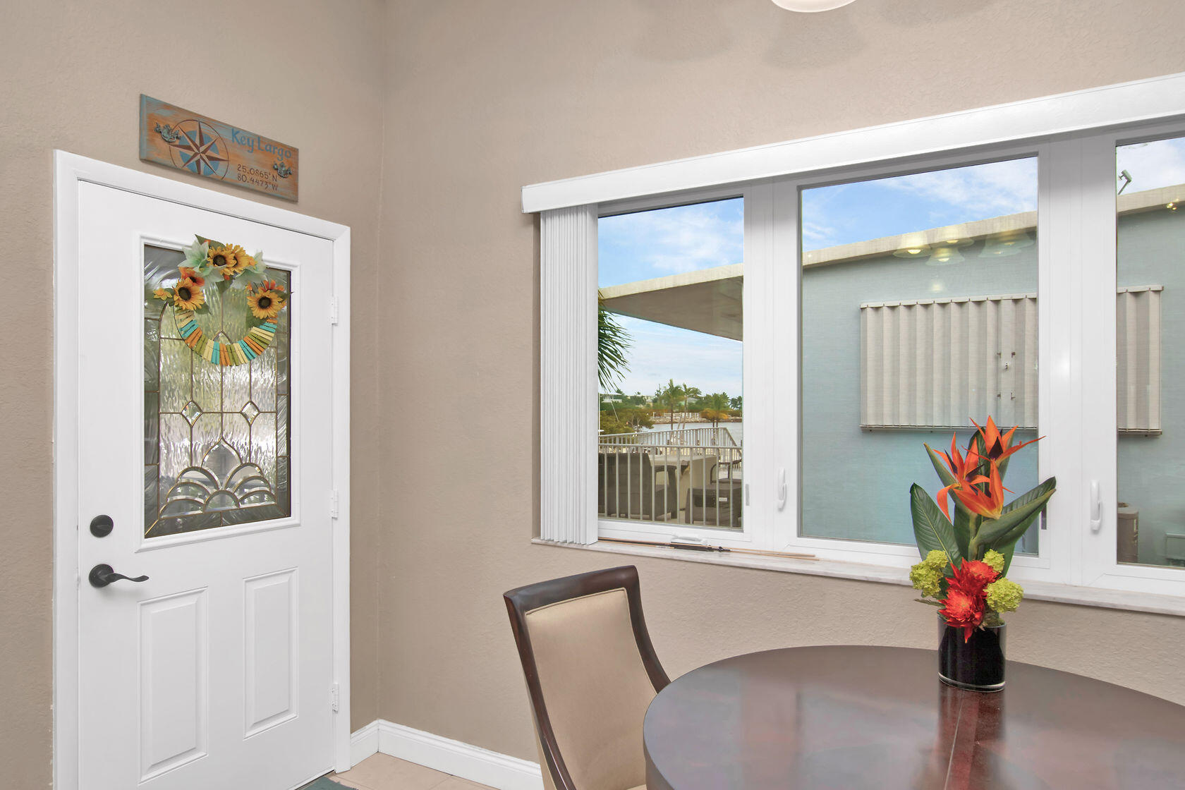 80 Seagate Boulevard Key Largo, FL 33037 - Photo 18 of 46 a dining room with furniture and window