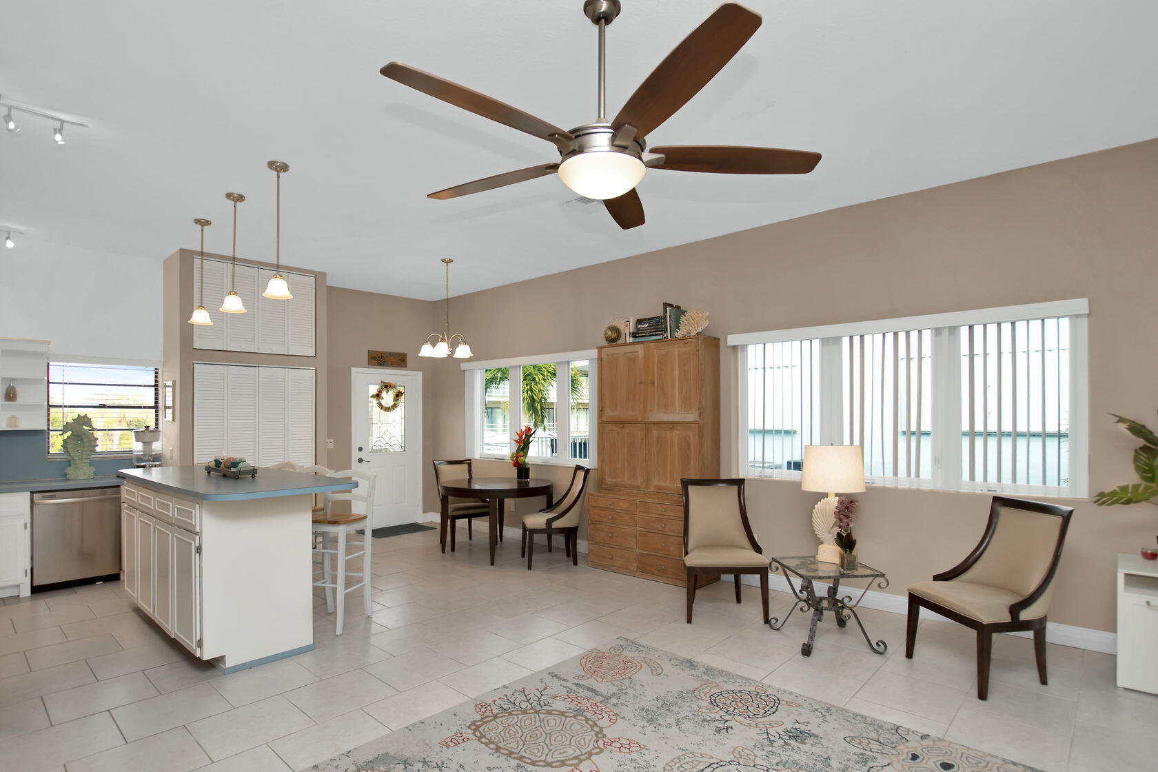 80 Seagate Boulevard Key Largo, FL 33037 - Photo 24 of 46 a large kitchen with a table and chairs
