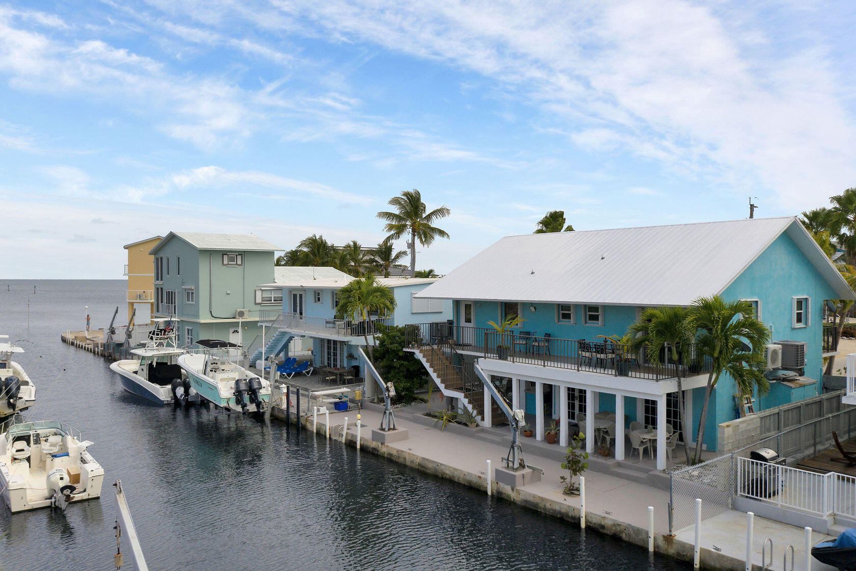 80 Seagate Boulevard Key Largo, FL 33037 - Photo 3 of 46 a view of a house with roof deck