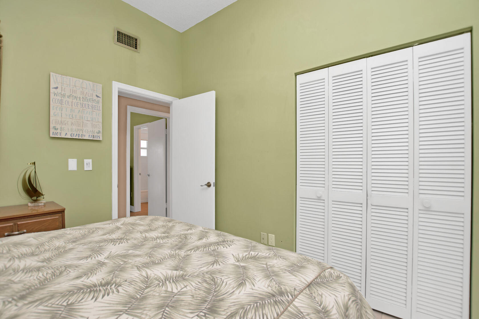 80 Seagate Boulevard Key Largo, FL 33037 - Photo 33 of 46 a bedroom with a bed and a window