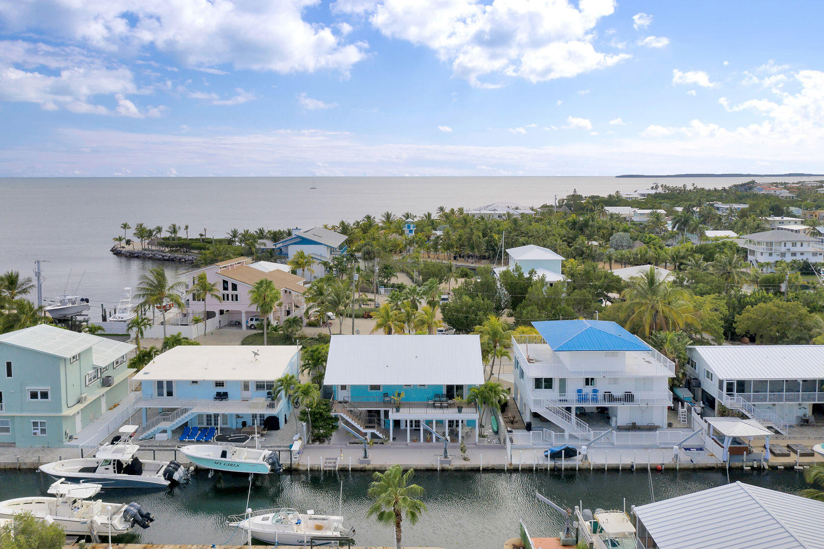 80 Seagate Boulevard Key Largo, FL 33037 - Photo 4 of 46 an aerial view of multiple house