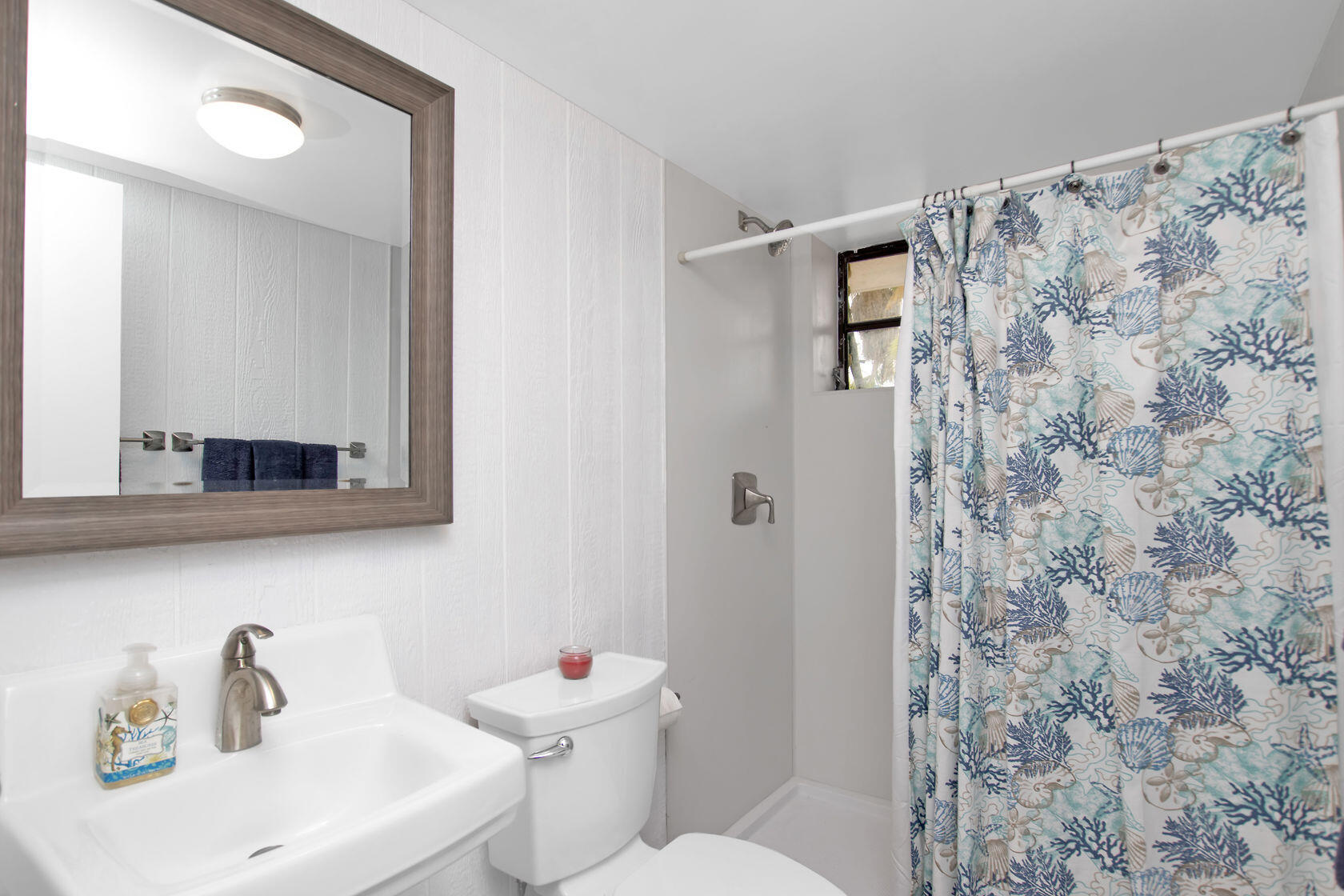 80 Seagate Boulevard Key Largo, FL 33037 - Photo 41 of 46 a bathroom with a sink and a toilet