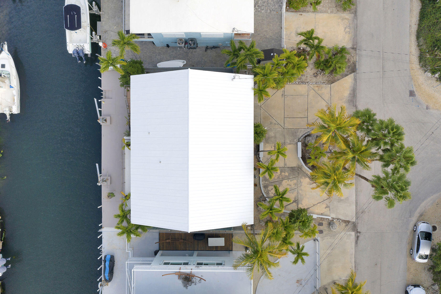 80 Seagate Boulevard Key Largo, FL 33037 - Photo 42 of 46 an aerial view of a house with a yard and sitting area