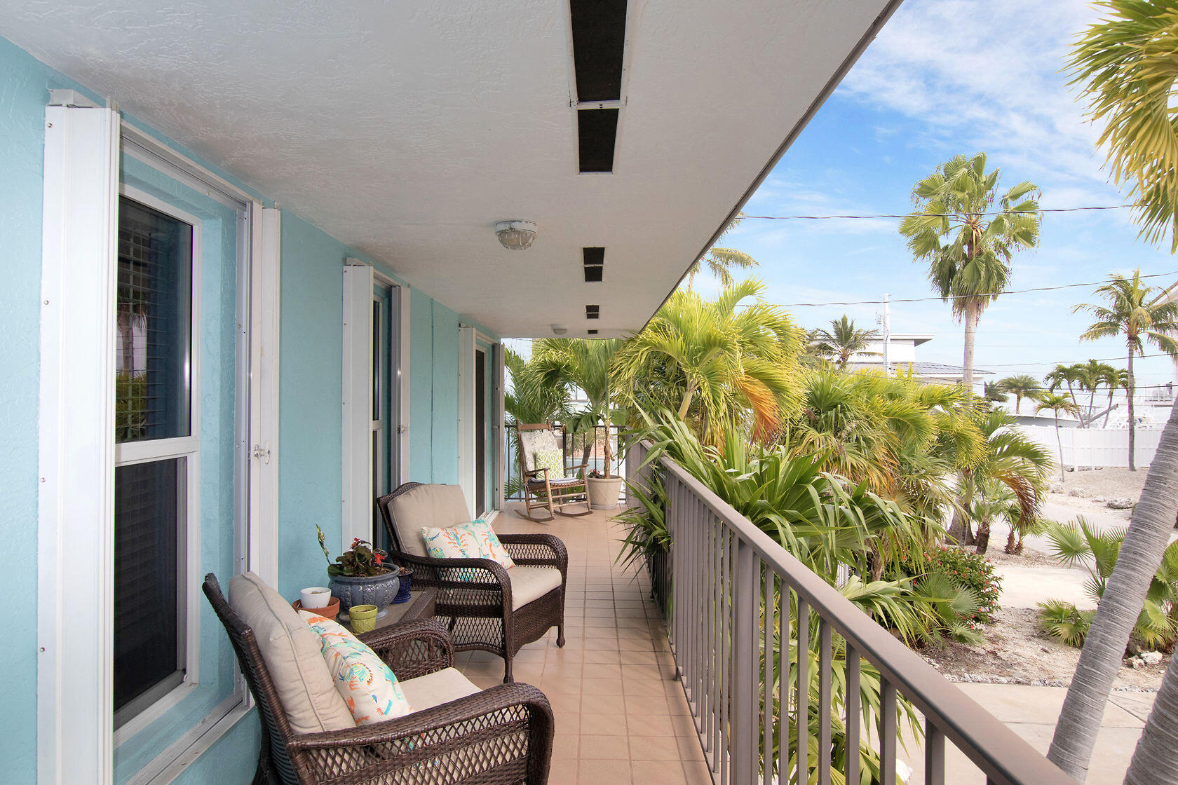 80 Seagate Boulevard Key Largo, FL 33037 - Photo 43 of 46 a balcony with table and chairs