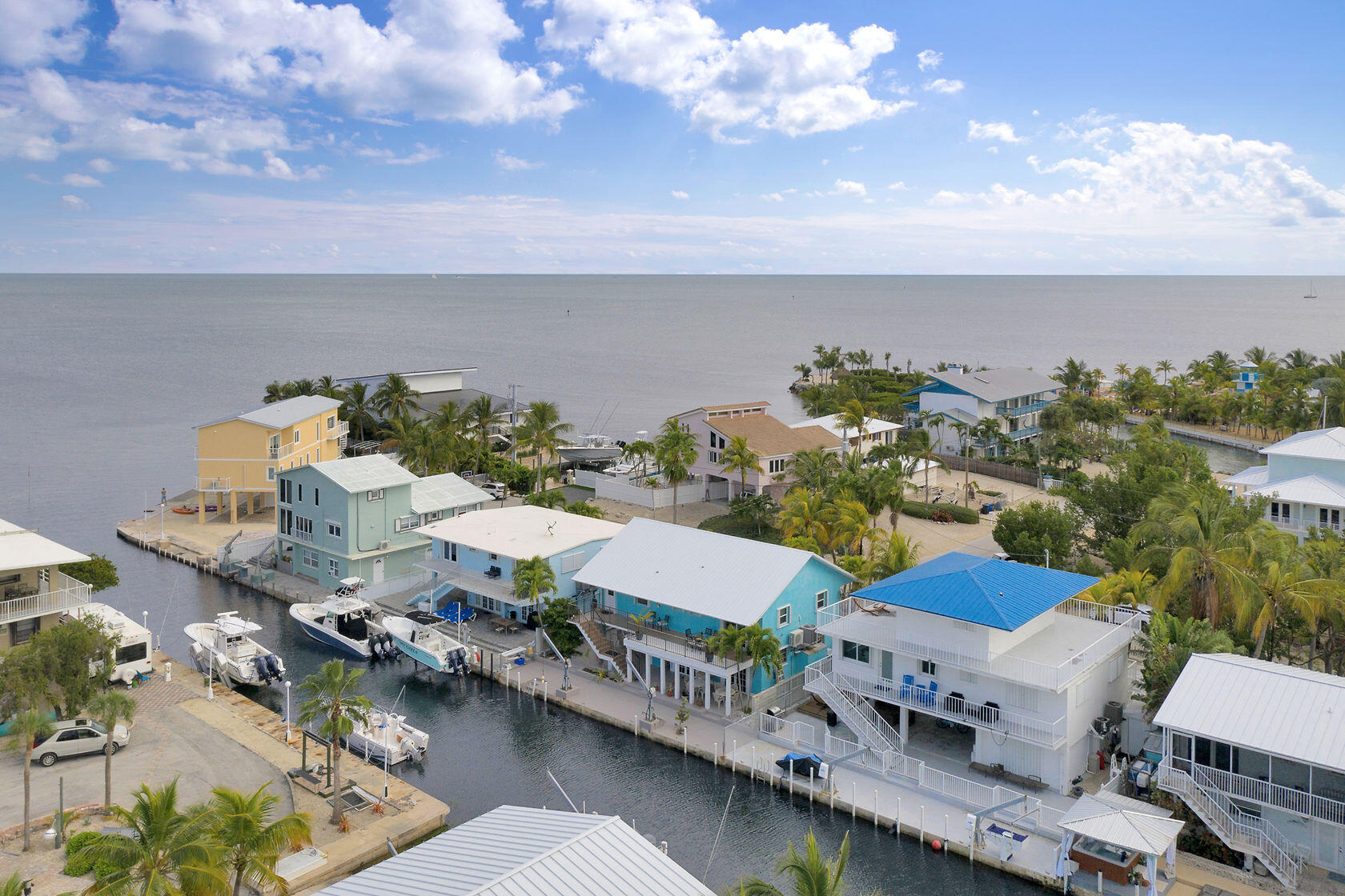 80 Seagate Boulevard Key Largo, FL 33037 - Photo 5 of 46 an aerial view of houses with yard