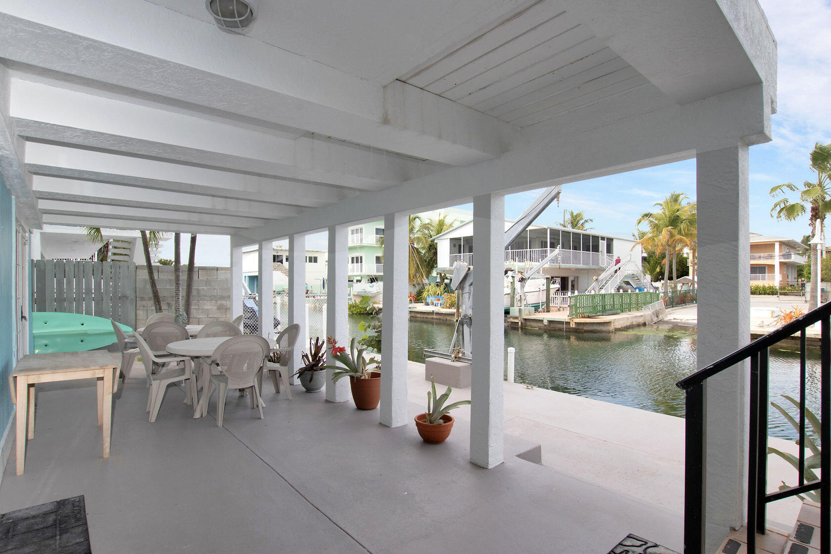 80 Seagate Boulevard Key Largo, FL 33037 - Photo 10 of 46 a living room with furniture and floor to ceiling windows