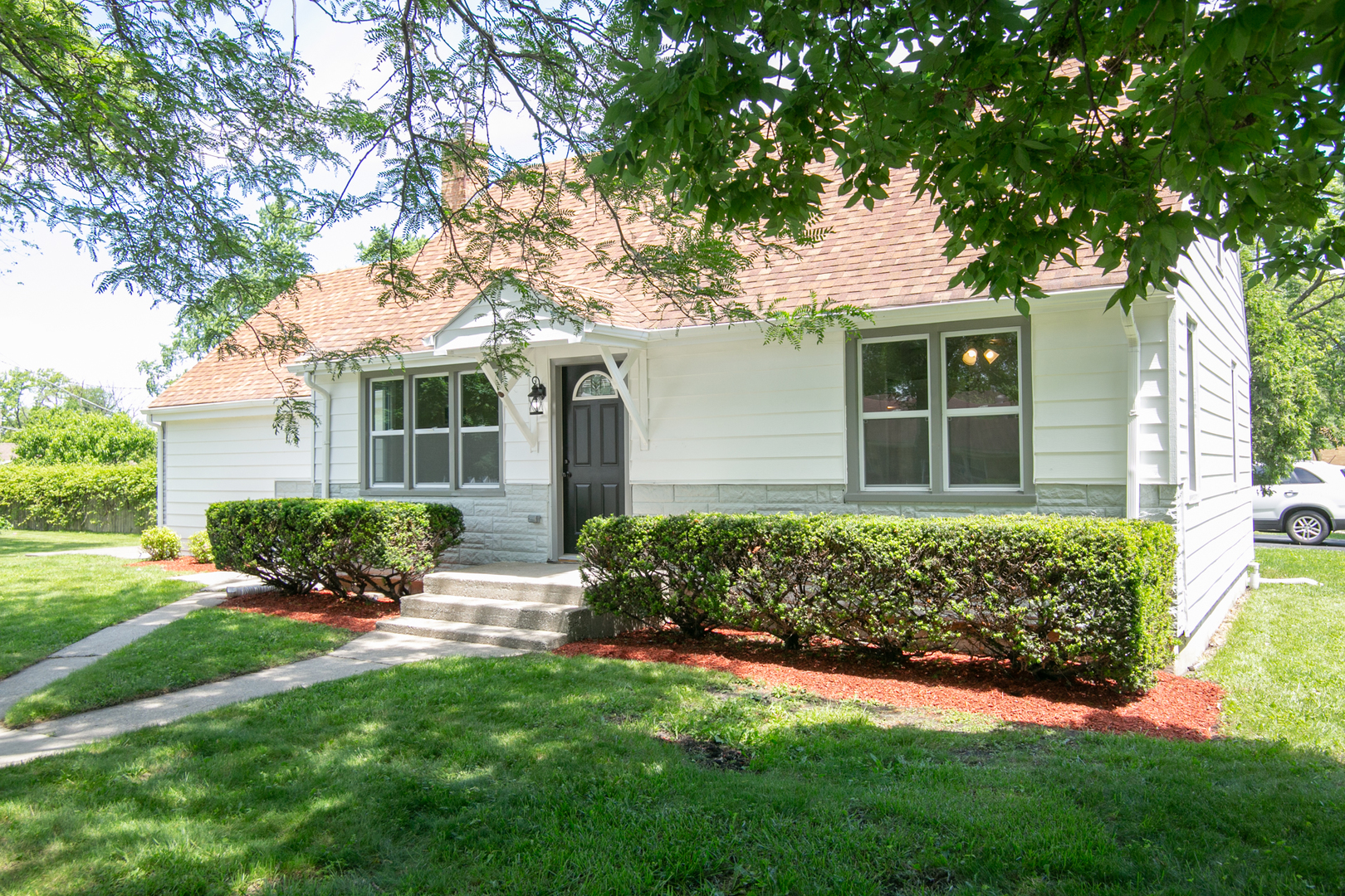 6000 Birmingham Street Chicago Ridge, IL 60415 - Photo 1 of 23 front view of a house with a yard