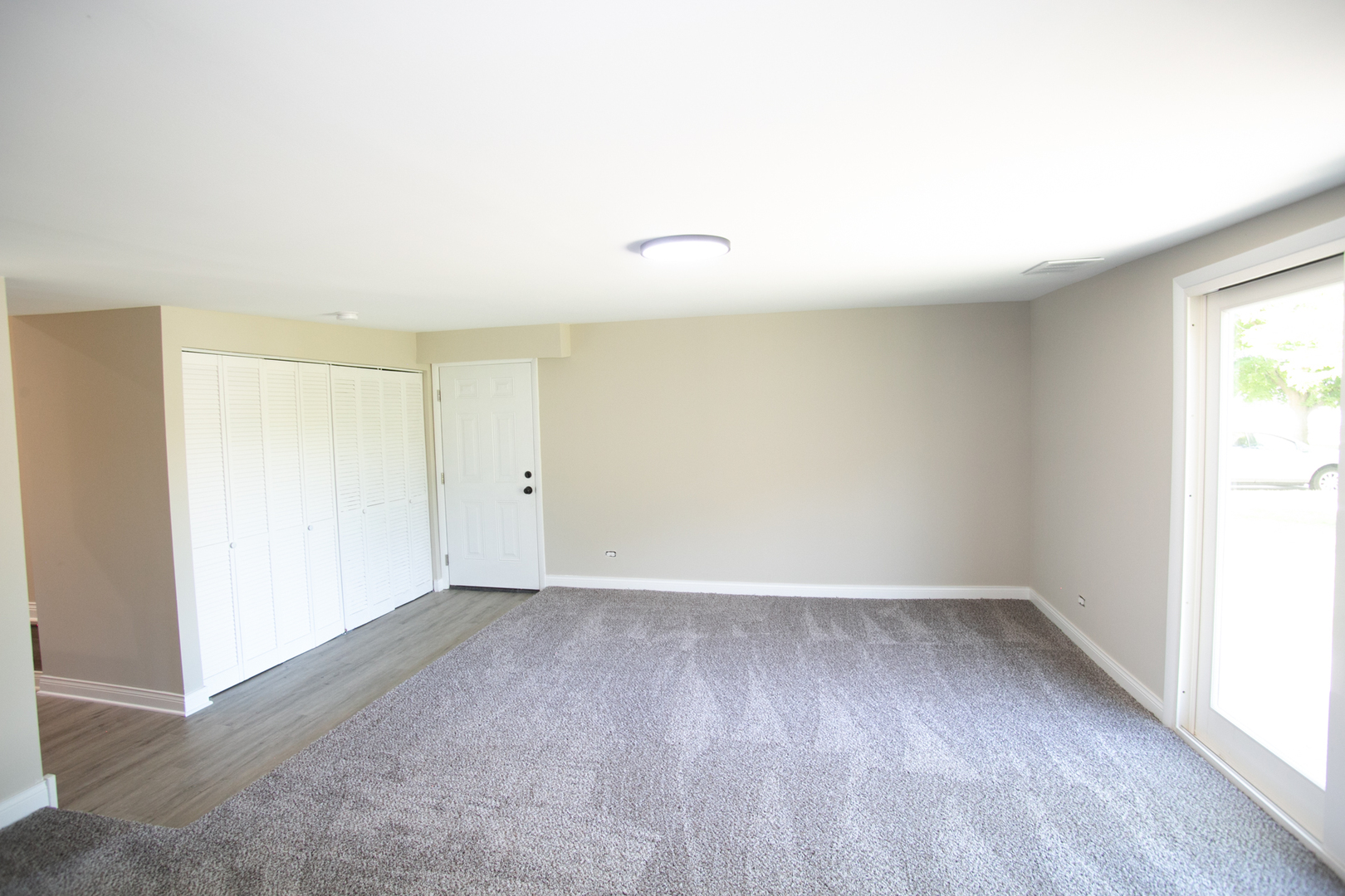 6000 Birmingham Street Chicago Ridge, IL 60415 - Photo 12 of 23 a view of an empty room with wooden floor and a window